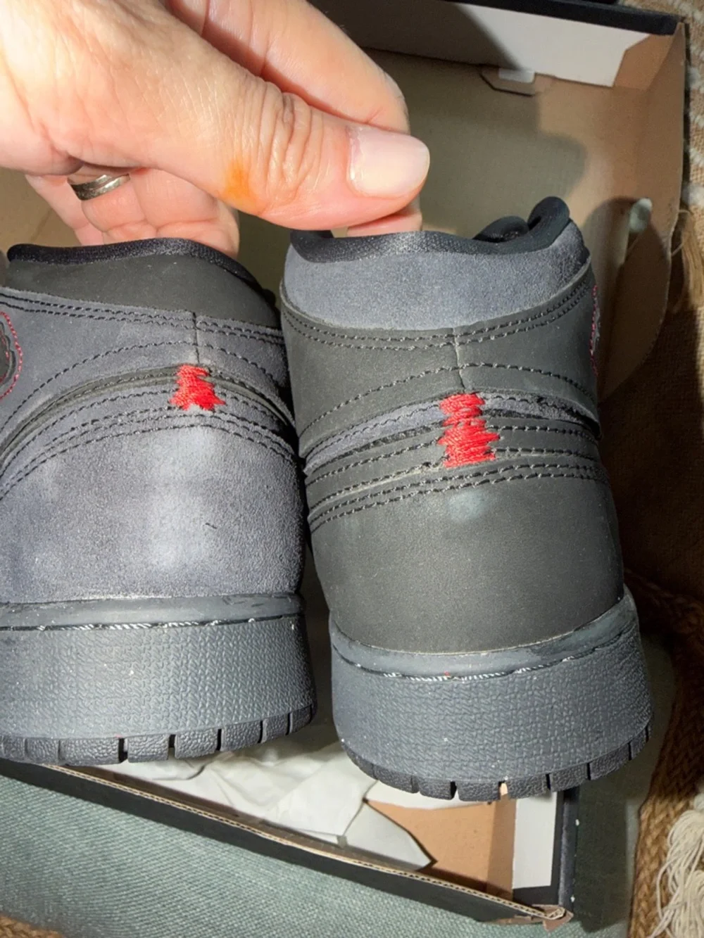 Nike Kids' Black High-Top Sneakers with Red Stitch Accent